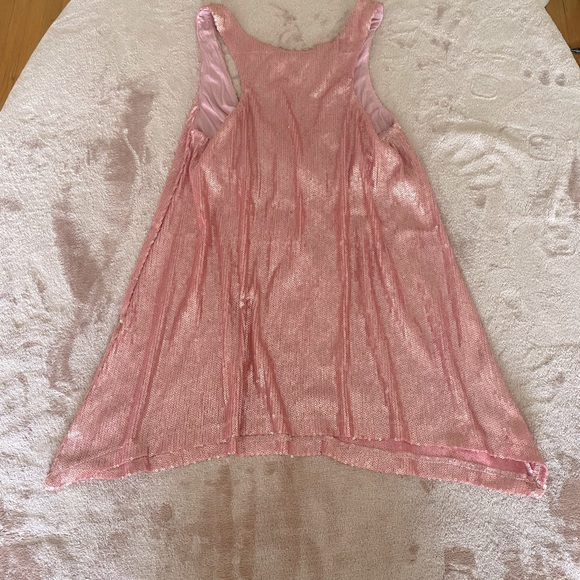 Shiny babydoll shirt. Stunning with a pair of heels and jeans. - Picture 6 of 15